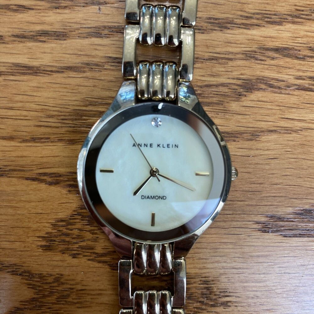 Anne Klein Watch Womens Mother of Pearl Dial 34mm Case Gold Tone Quartz Working